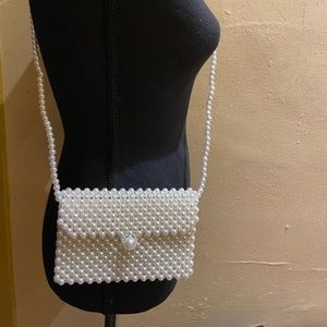 New…….Faux white pearl purse